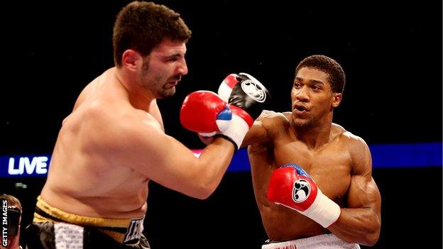 Anthony Joshua on his way to a first-round stoppage of Emanuele Leo