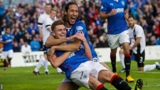 Bilel Mohsni congratulates fellow Rangers scorer Lewis Macleod