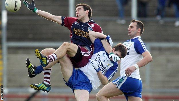 Ballinascreen's Brendan Heron beat Gareth McKinless of Ballinderry to a high ball