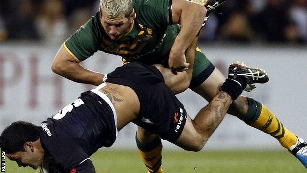 New Zealand's Issac Luke (left) is tackled by Australia's Greg Bird during their rugby league Test at Canberra Stadium on 19 April 2013