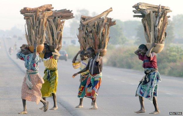 Gwari people crossing road