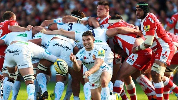 Exeter's Dave Lewis gets his pass away against Gloucester