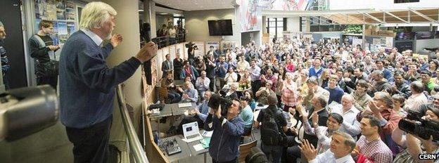 Cern director general Rolf Heuer joins physicists celebrating the Nobel Prize announcement