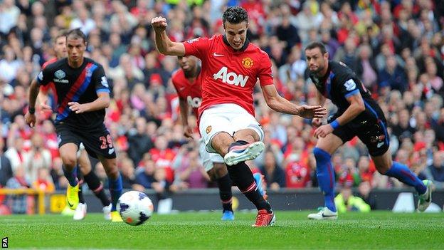 Manchester United's Robin van Persie scores from the penalty spot against Crystal Palace at Old Trafford