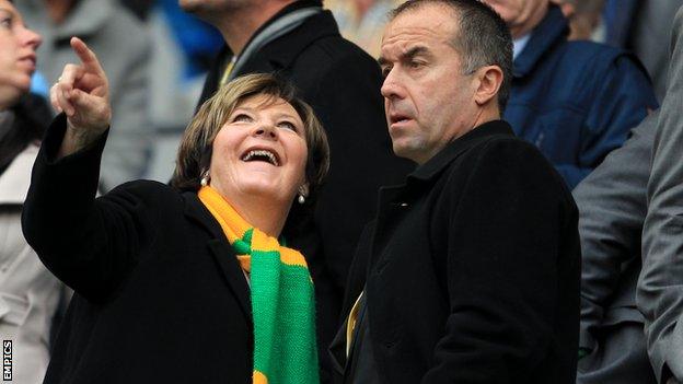 Norwich majority shareholder Delia Smith talks to chief executive David McNally