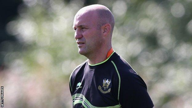 Alex King observes Saints training