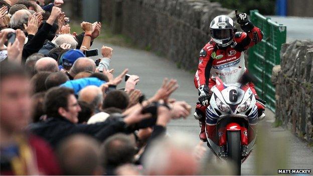 Michael Dunlop receives a great reception from fans as he makes his way back to the winners' enclosure after Sunday's Superbike race on the Isle of Man