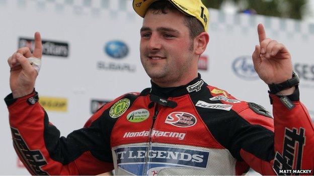 Ballymoney's Michael Dunlop savours his big moment after winning the Superbike race at the TT Races