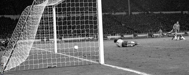 Jan Domarski's shot slid past Peter Shilton on a greasy pitch