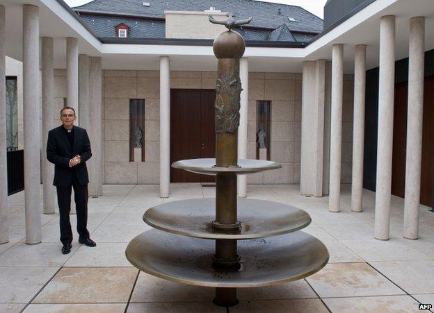 The Bishop of Limburg, Franz-Peter Tebartz-van Elst, stands in the inner courtyard of his residence in Limburg, 3 December 2012