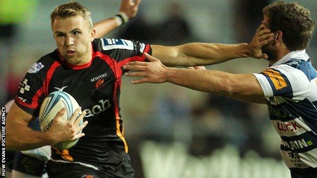 Tom Prydie looks to break through for the Dragons at Rodney Parade