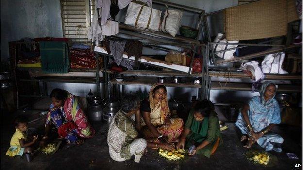 People sheltering from Cyclone Phailin near Bhubaneswar, 12 October 2013