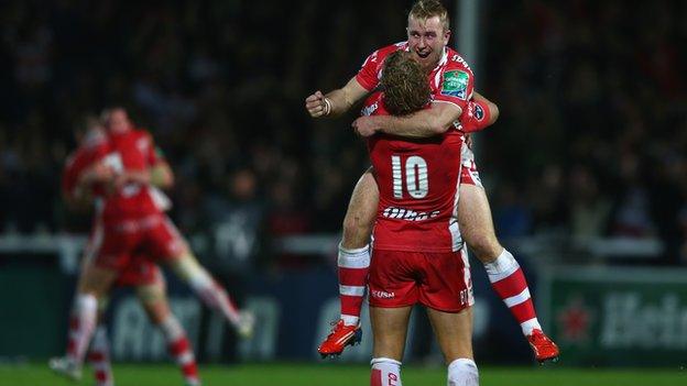 Dan Robson and Billy Twelvetrees celebrate Gloucester's win over Perpignan