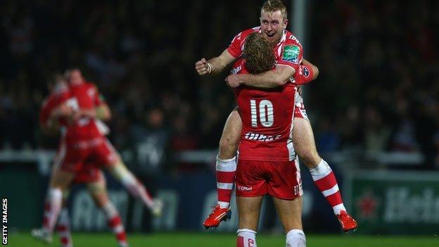 Dan Robson and Billy Twelvetrees celebrate Gloucester's win over Perpignan