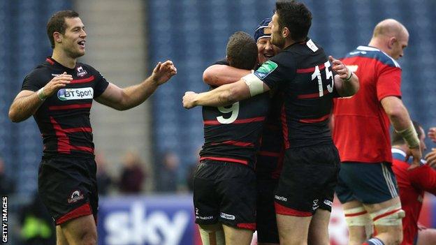 Edinburgh players celebrate the Heineken Cup win over Munster