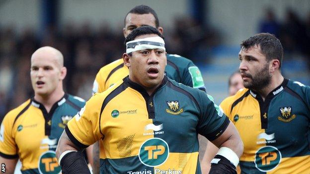 Northampton Saints prop Salesi Ma'afu and team-mates gather against Castres