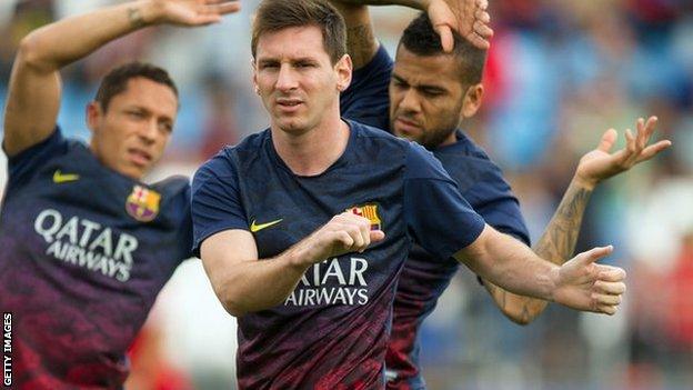 Lionel Messi (centre) during training for Barcelona