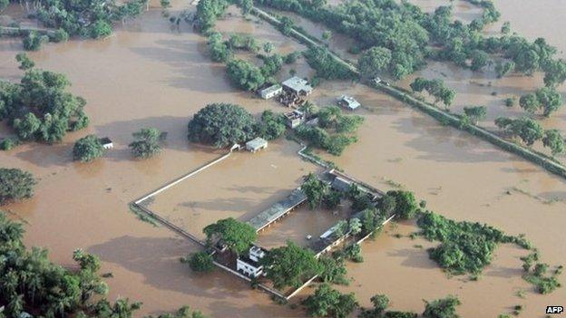 This handout photograph released by the Ministry of Defence shows a flooded area near Balasore following Cyclone Phailin on October 14, 2013