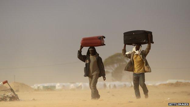 Africa men walking