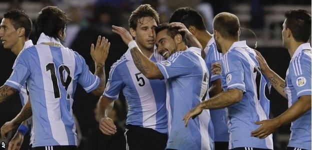 Argentina celebrate scoring against Peru