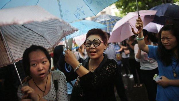 Parents in Shanghai waiting for their children to finish exams