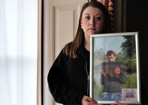 The only photograph Holly Watson has of her late brother Lewis is this one of him holding a fish