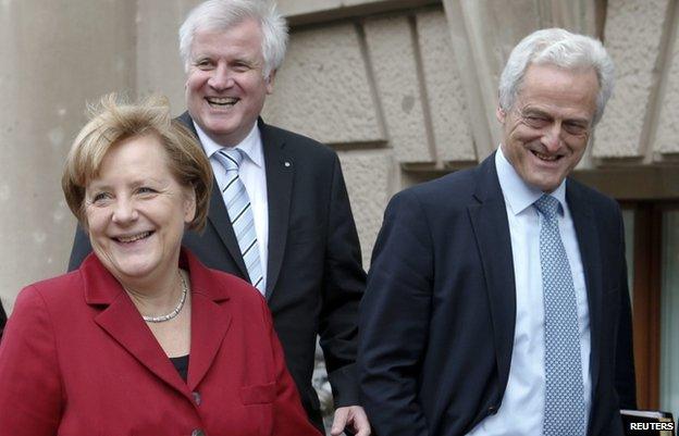 Angela Merkel and her CSU allies (from left) Horst Seehofer and Peter Ramsauer leave talks with the SPD in Berlin, 17 October