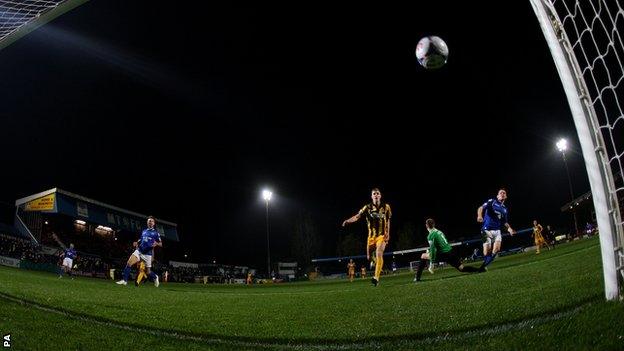 Connor Jennings (right) scores Macclesfield's first goal