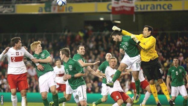 Republic keeper David Forde punches clear in February's game against Poland