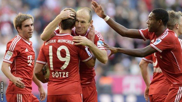 Bayern Munich players celebrate after scoring against Mainz