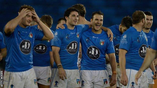 Italy's players celebrate