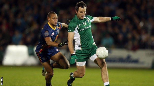 Ireland captain Michael Murphy is chased by Australia's Cameron Ellis-Yolmen