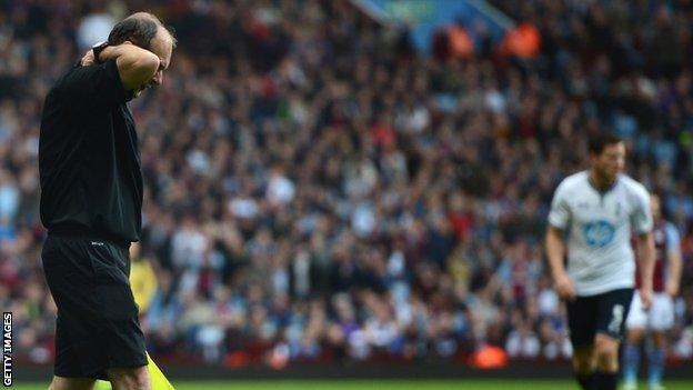 Linesman David Bryan who was hit by a flare during the Aston Villa v Tottenham Hotspur match.