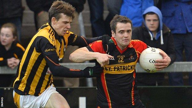 Crossmaglen's Paul Hughes tackles Eugene Casey of Cullyhanna