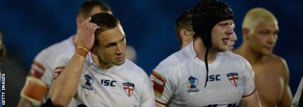 England captain Kevin Sinfield (left) shows his disappointment after his team's defeat against Italy