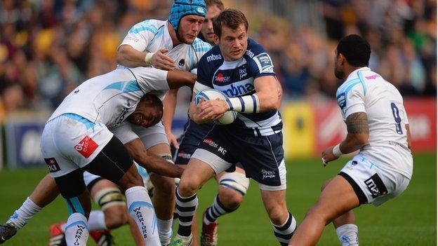 Sale wing Mark Cueto causes chaos at Sixways as he skips inside Josh Drauniniu and Richard De Carpentier