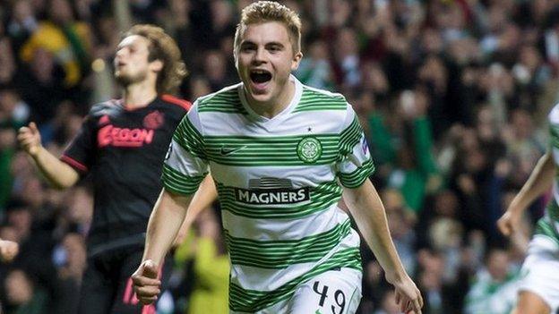 James Forrest celebrates scoring the opener for Celtic from the penalty spot