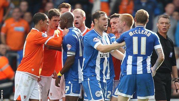 Wigan's James McClean is sent off against Blackpool