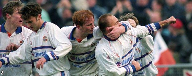 John Hartson (centre) celebrates a Luton goal at Cardiff in 1995