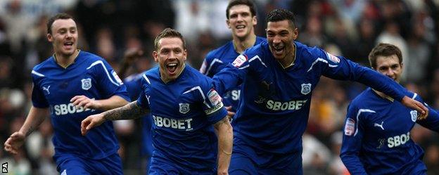 Craig Bellamy and team-mates celebrate