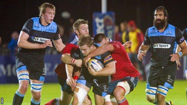 Pat MacArthur is closed down by Munster's CJ Stander and Ivan Dineen