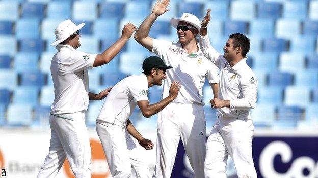 South Africa celebrate the wicket of Misbah-ul-Haq in Dubai