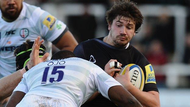 Newcastle's Adam Powell comes up against Topsy Ojo of London Irish