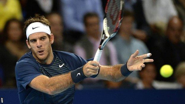 Juan Martin Del Potro in action against Roger Federer in the final of the Swiss Indoors