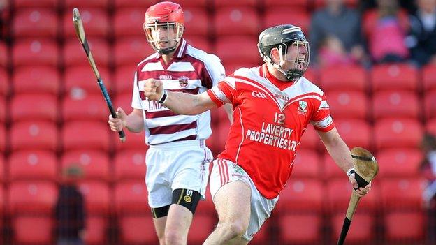 Eddie McCloskey celebrates after scoring Loughgiel's first goal against Slaughtneil