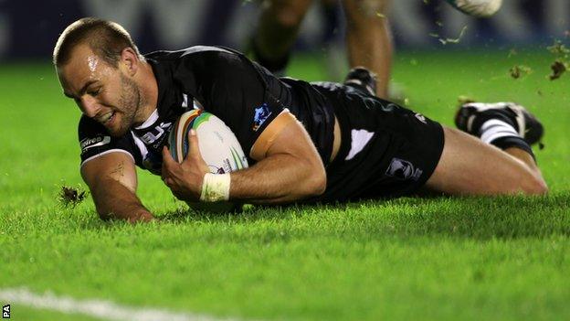 New Zealand captain Simon Mannering (centre) scores a try during his side's win over Samoa