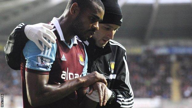 West Ham's goes off during the game against Swansea