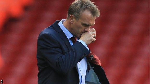 Crewe Alexandra manager Steve Davis shows his dejection after 3-1 defeat against Sheffield United