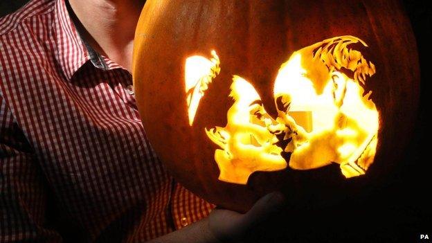 Pumpkin carving showing The Duke and Duchess of Cambridge