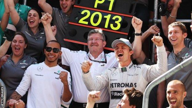 Lewis Hamilton, Ross Brawn and Nico Rosberg